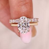 Solitaire Style Oval Diamond Ring With Diamond Band