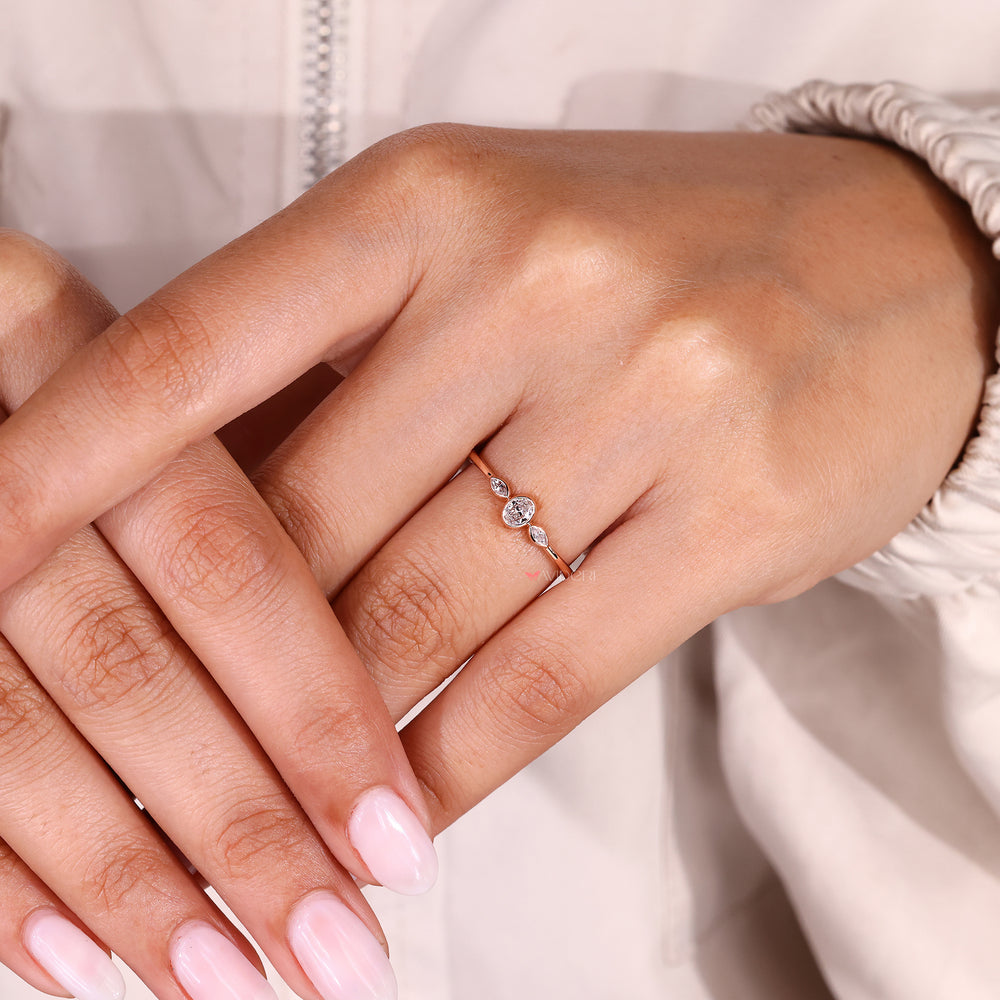 Handmade bezel set three stone diamond ring.
