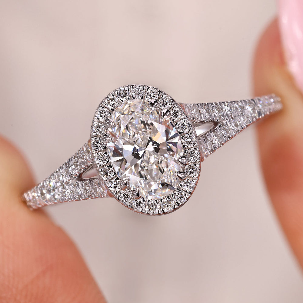 Oval shaped engagement ring with double claw prong setting.