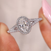 Oval Shaped Engagement Ring With Bridge Accent Setting