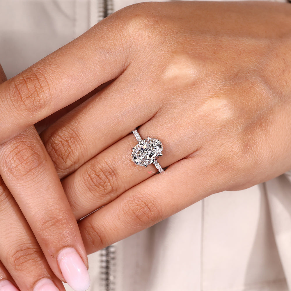 Oval lab grown diamond ring with open gallery.