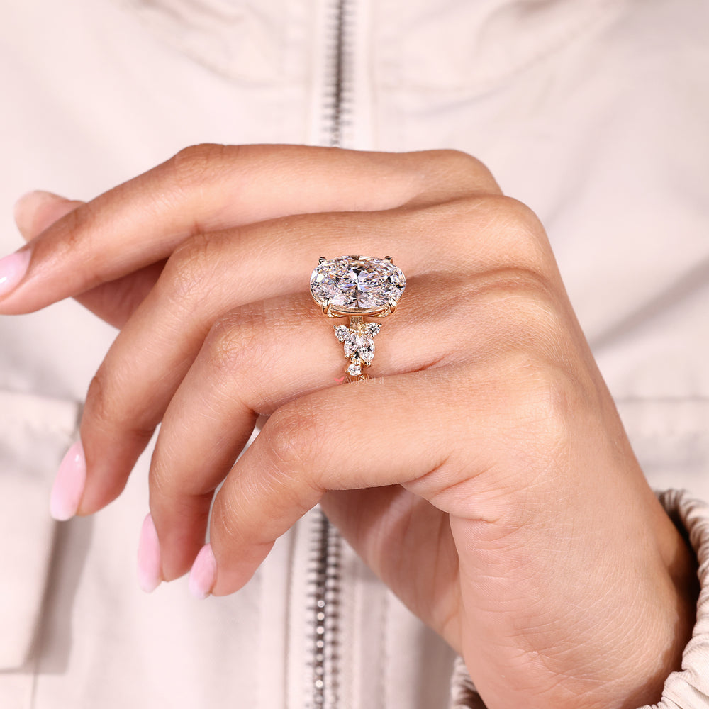 IGI certified oval cut diamond ring with side stones.
