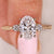Handmade oval diamond ring with three stone arrangement
