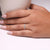 A shared prong wedding ring featuring precise craftsmanship.