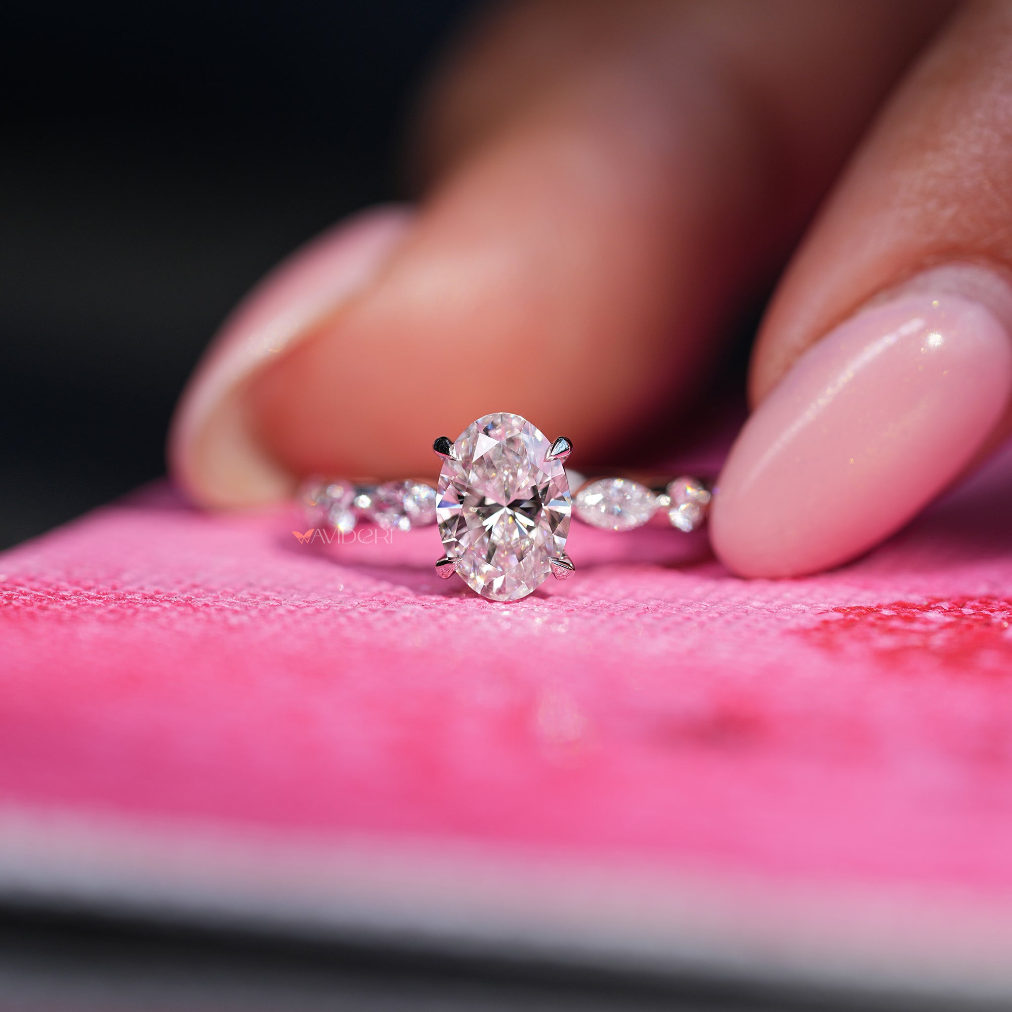 Oval ring, oval diamond, shared prong engagement ring.