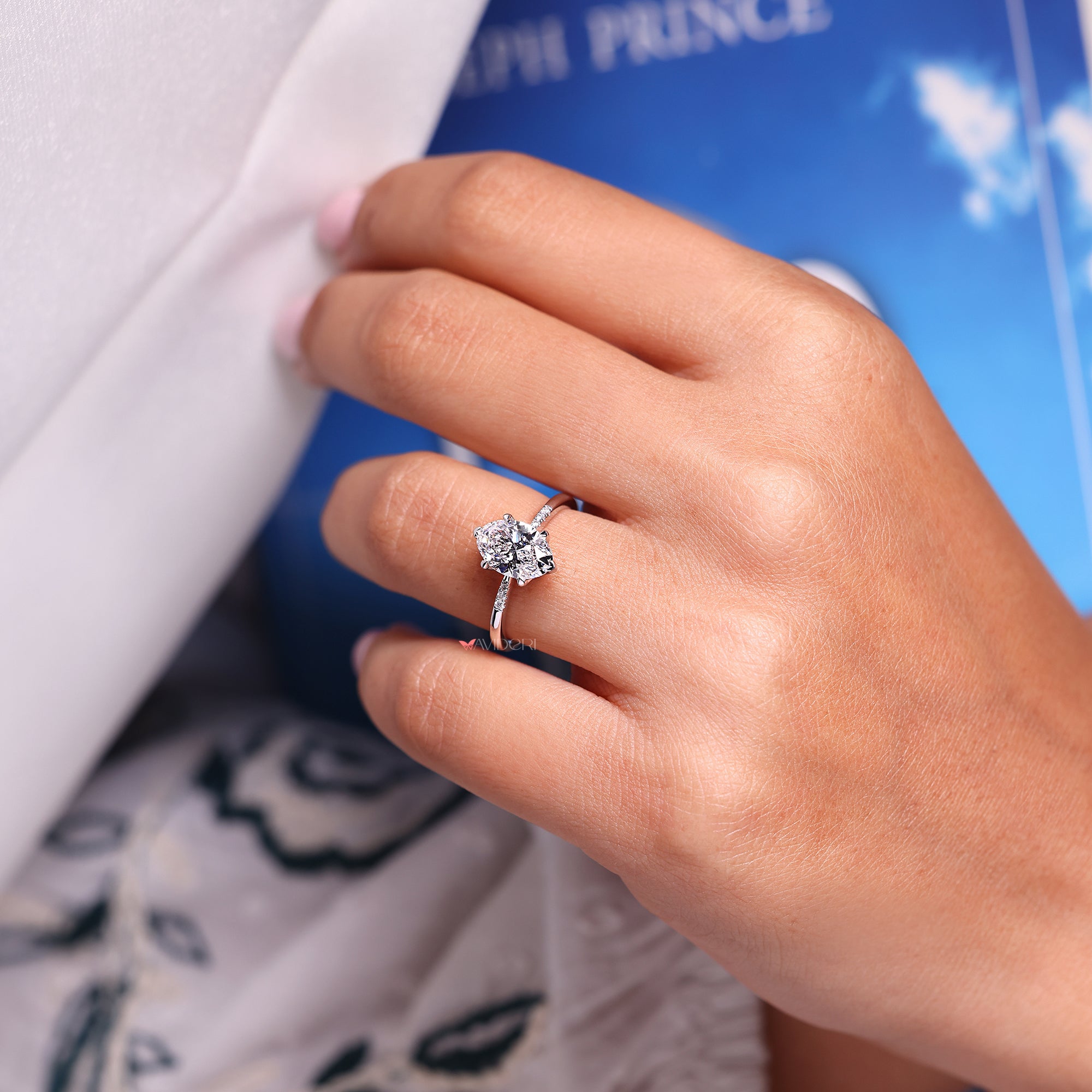 Handmade engagement ring with tapered shank.