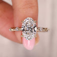 Oval diamond engagement ring shines with smooth oval shape.

