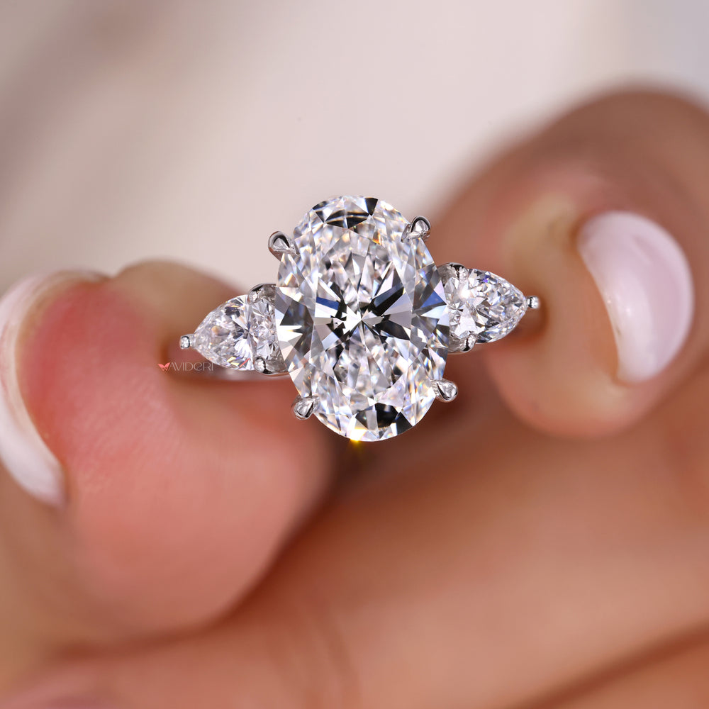 Lab Grown Diamond three stone oval engagement ring for a sustainable choice.
