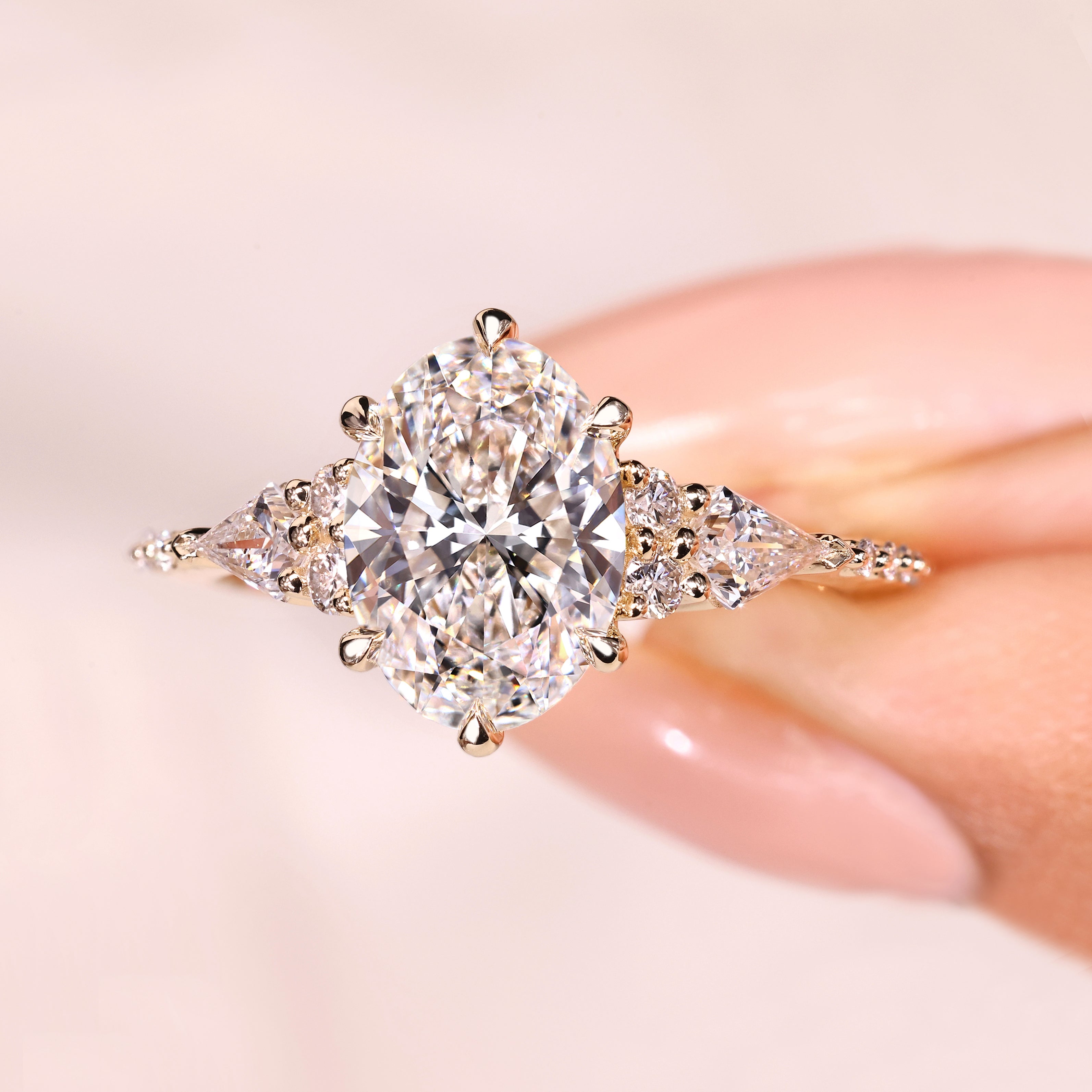 Lab grown oval ring with kite and round diamonds
