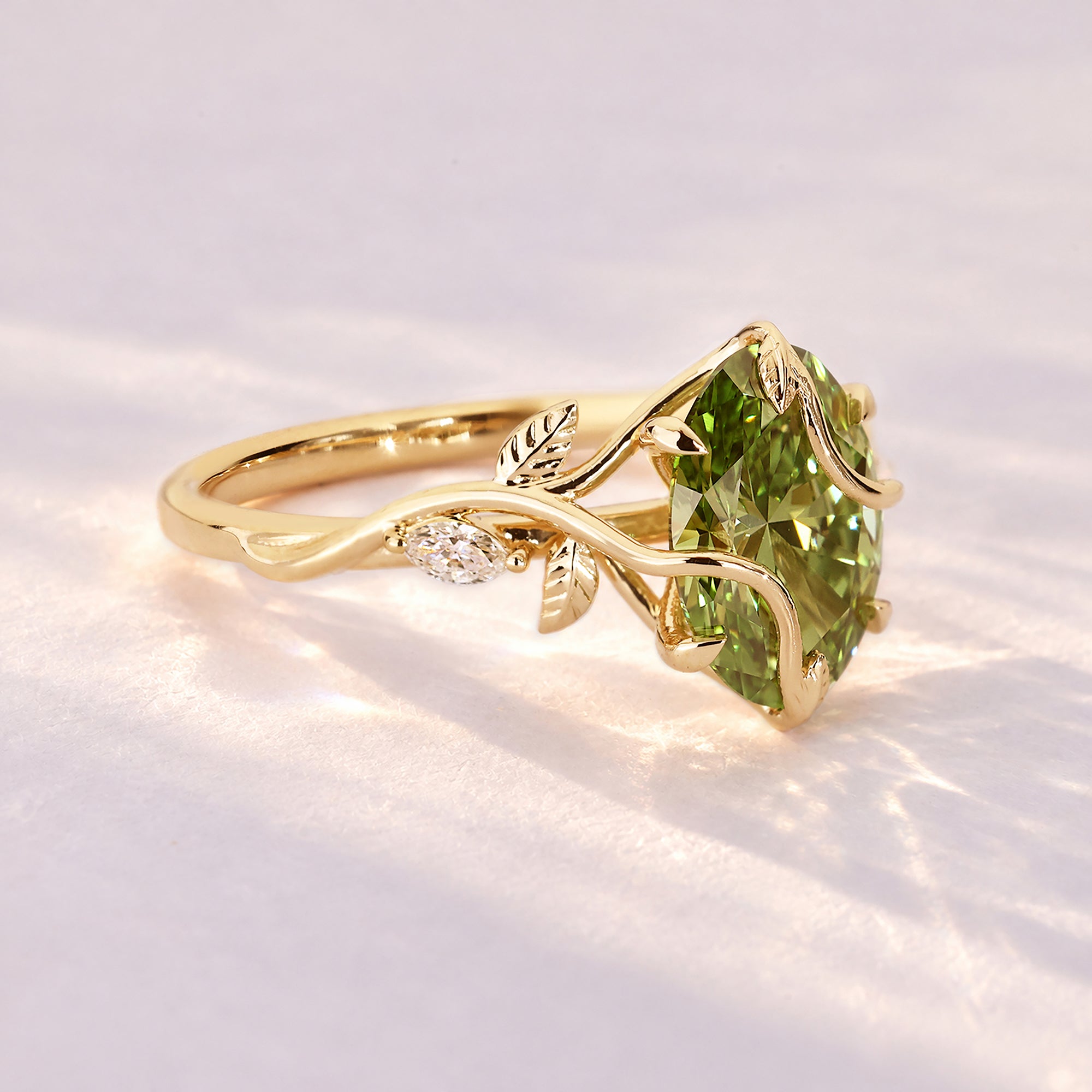 Oval diamond ring with nature inspired leaf prongs.