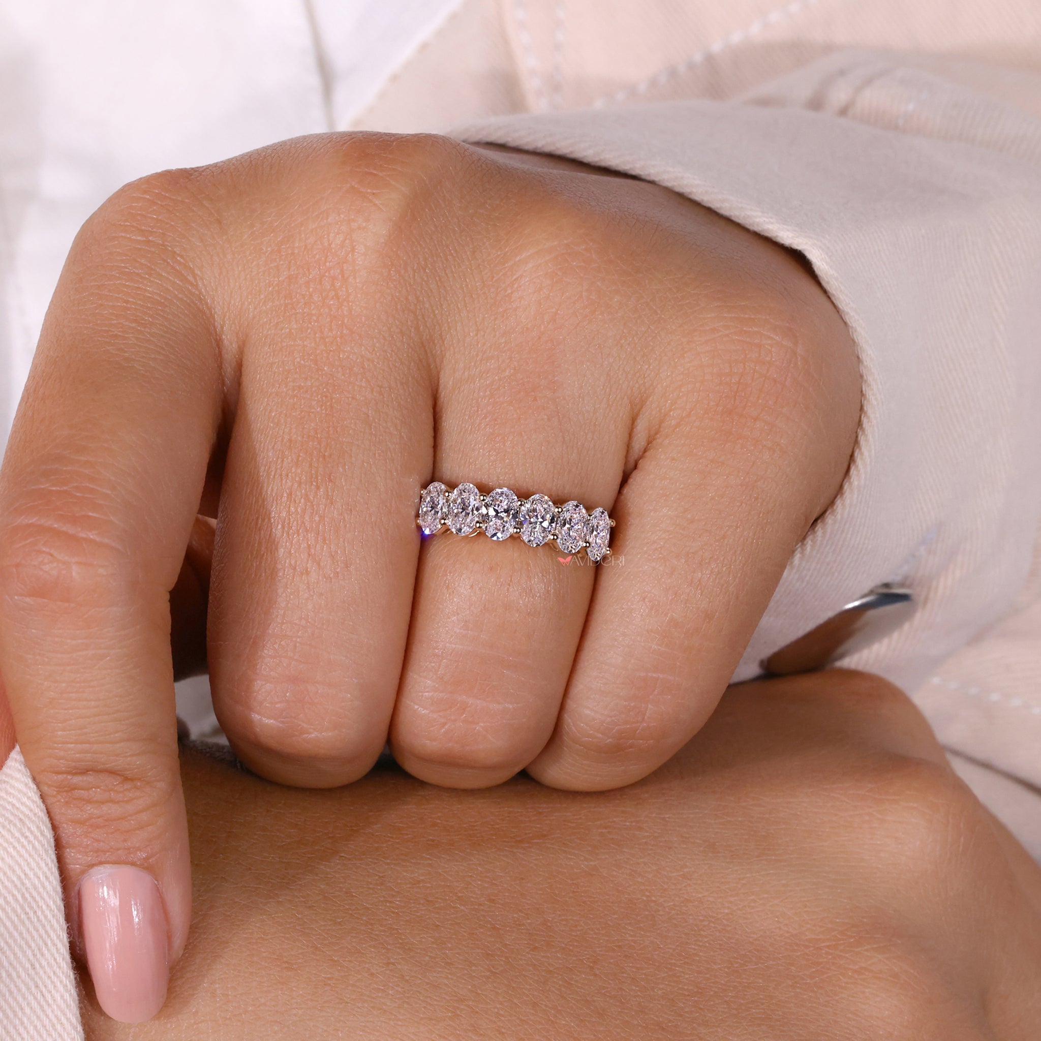 Custom oval half eternity band in gold.
