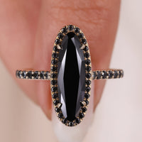 Black Moval Moissanite Ring With Cathedral Setting