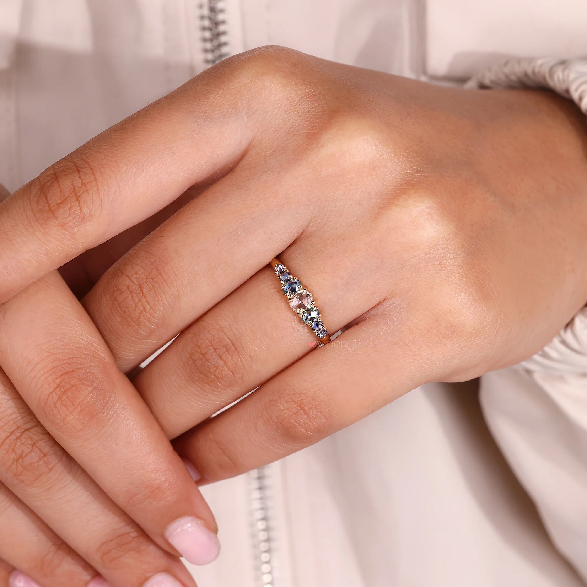 Handmade band with handmade jewelry details.