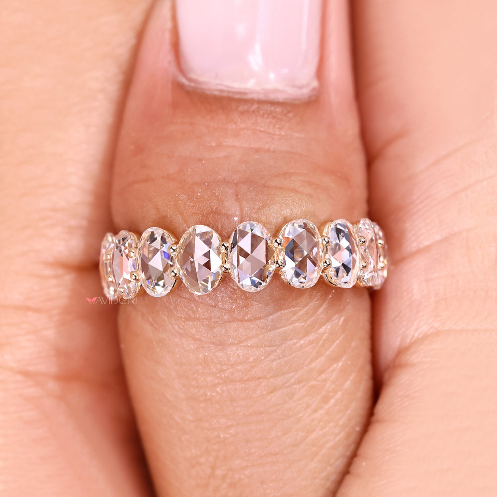 Classic eternity band with shared prong design.
