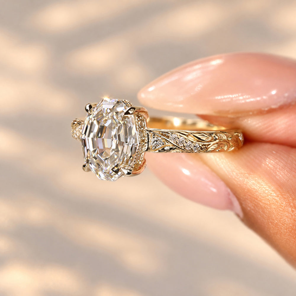 Engagement ring with ornate botanical filigree shank
