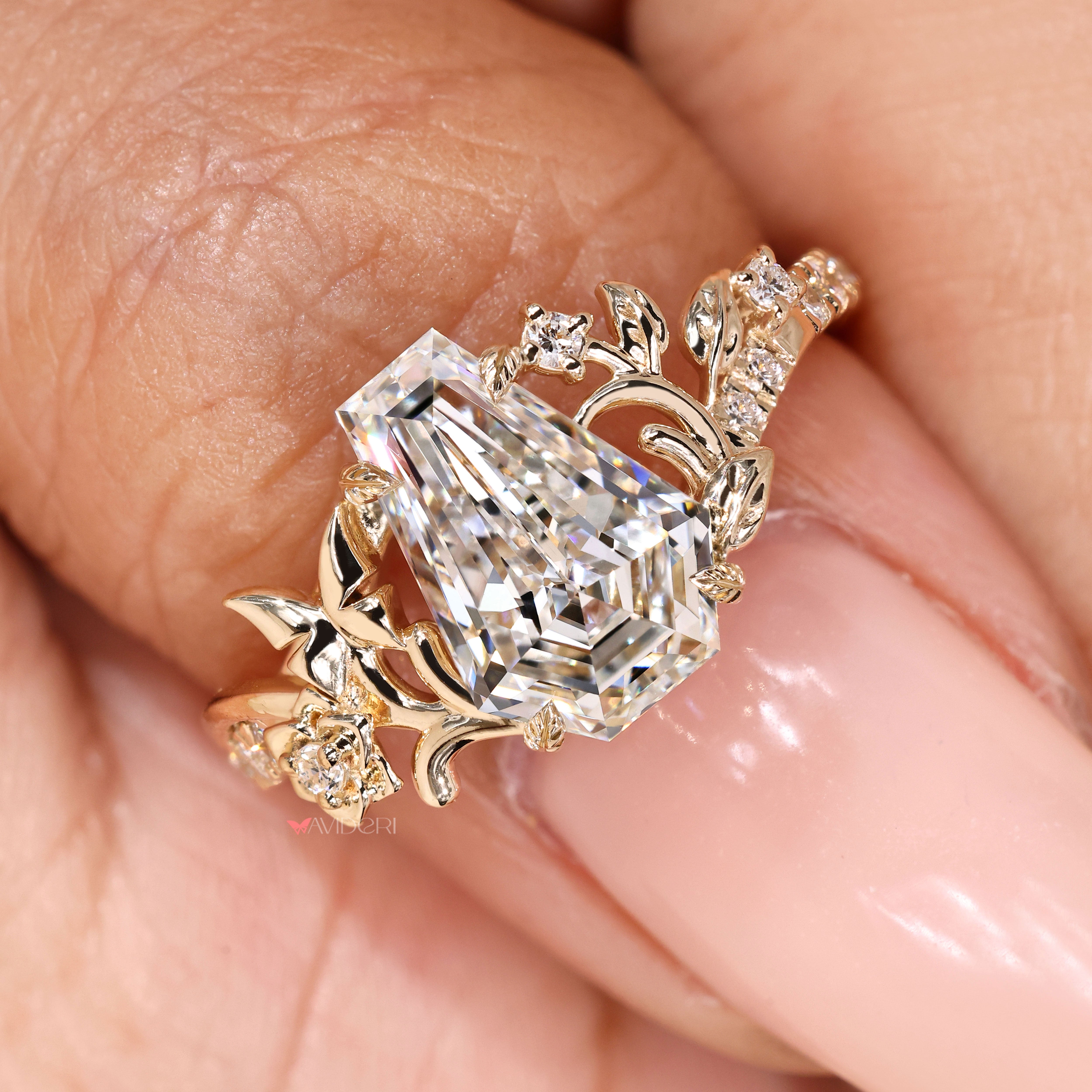 Round diamond pave coffin ring with leaf prongs.
