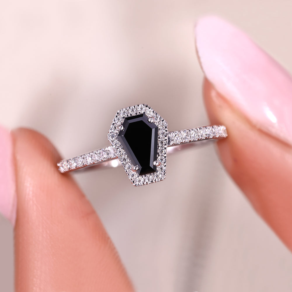 Coffin cut engagement ring with pave and halo style.