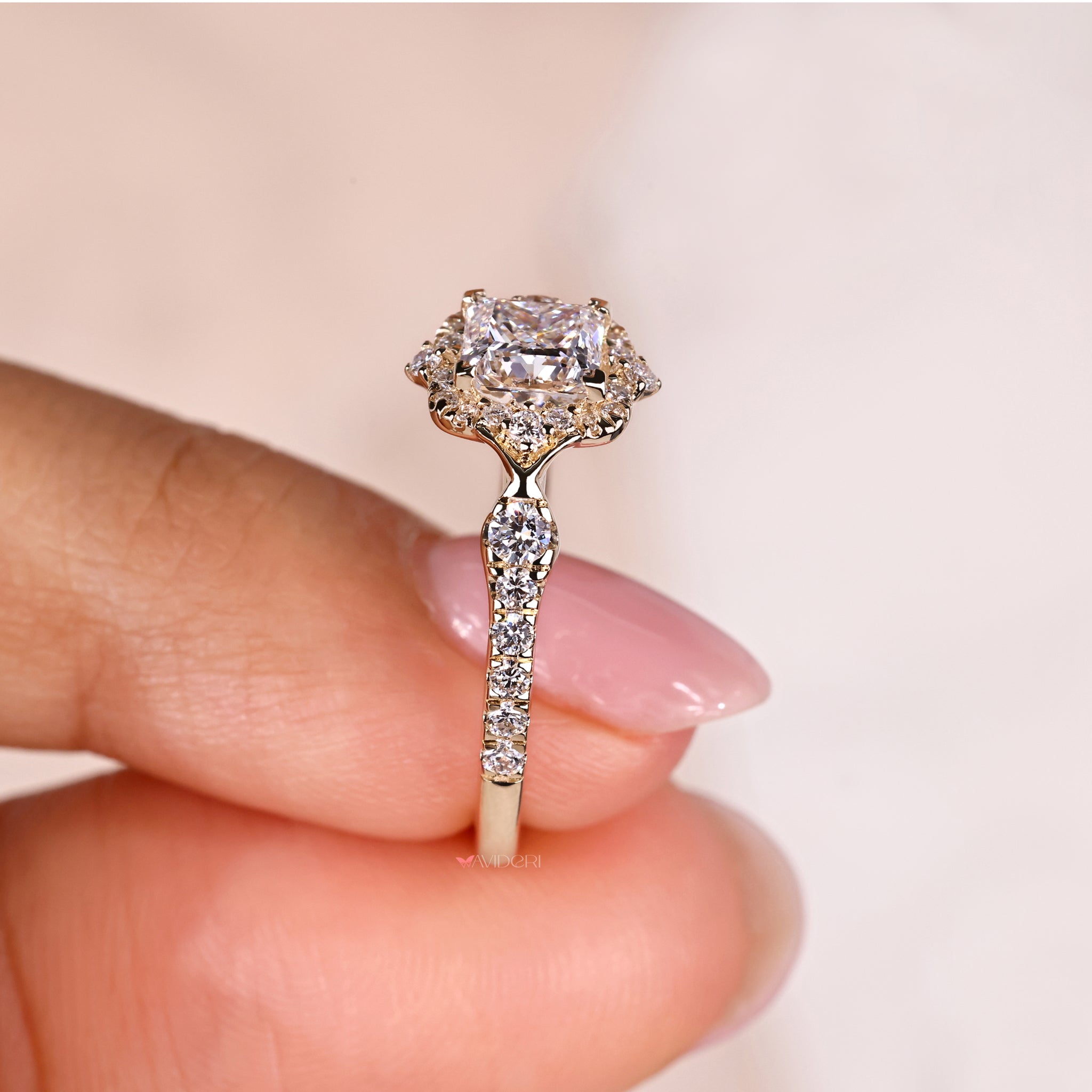 Pave diamond ring with princess cut diamond.