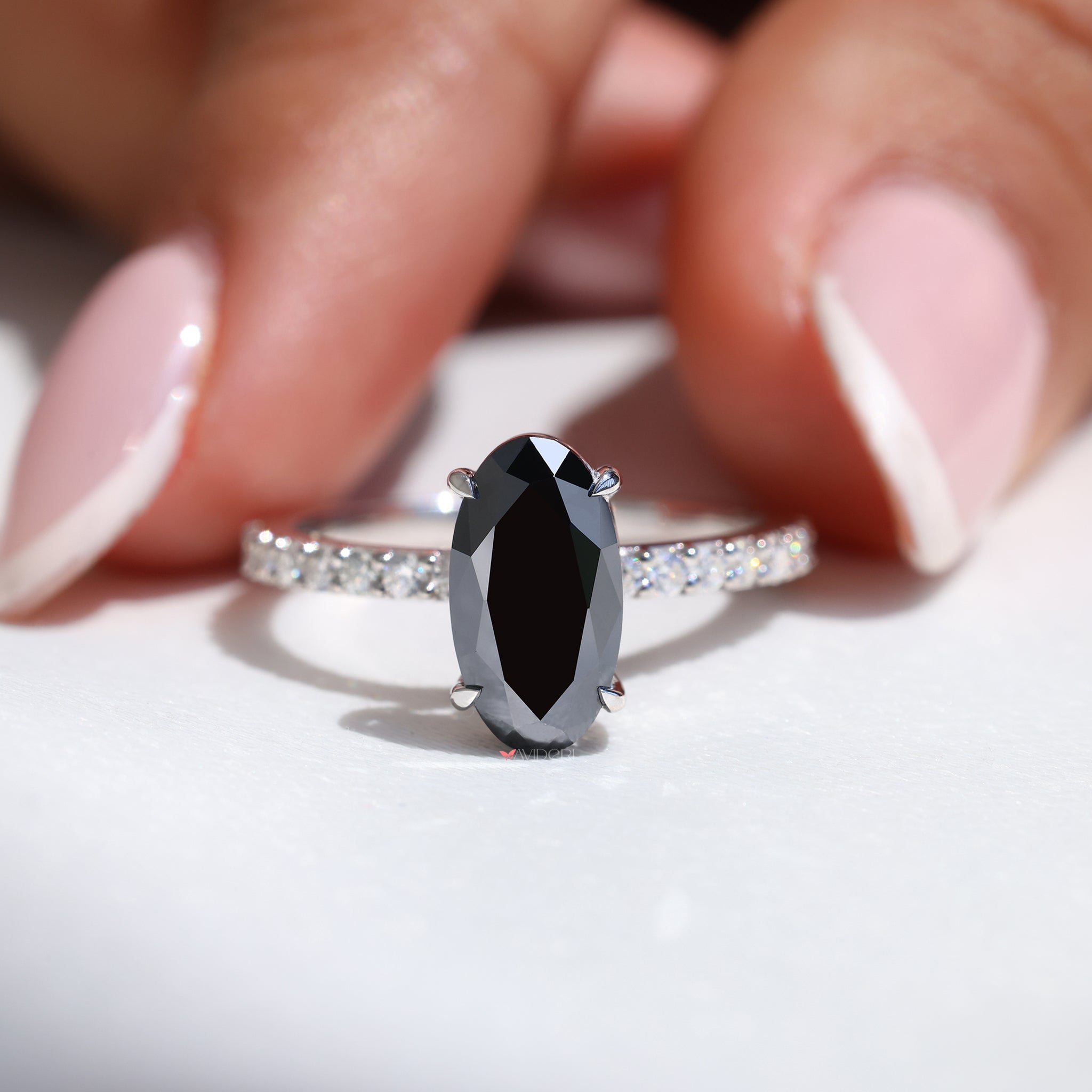 4 prong engagement ring with a secure and timeless design.
