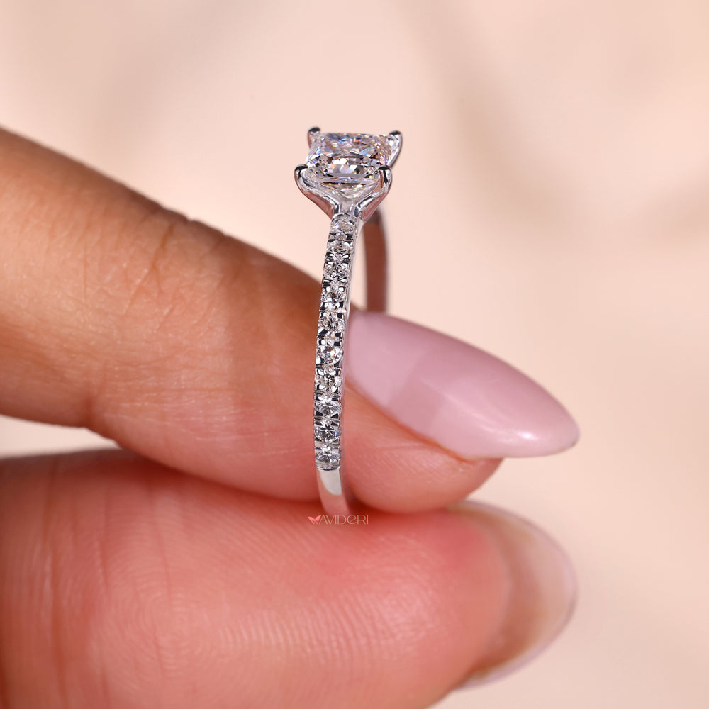 Pave diamond accents create a luxurious sparkle.
