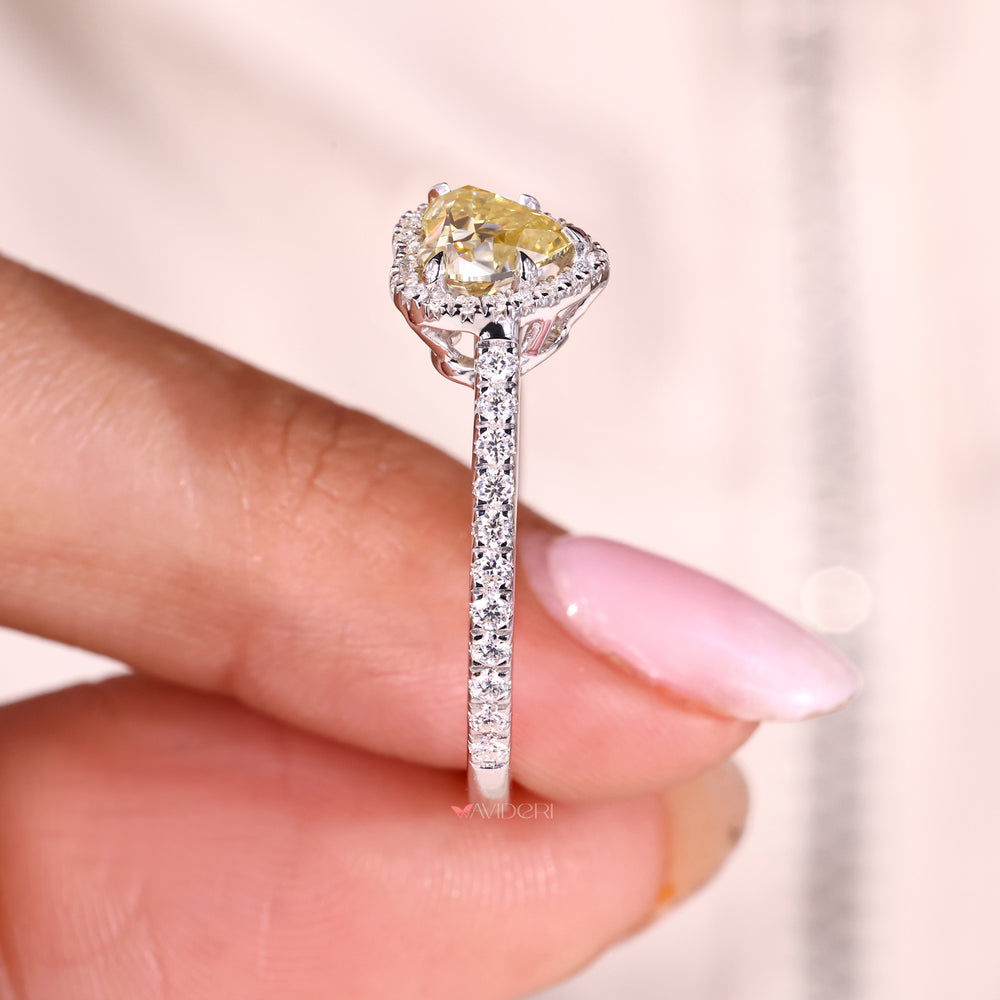 Heart cut ring with pave band and round moissanite.