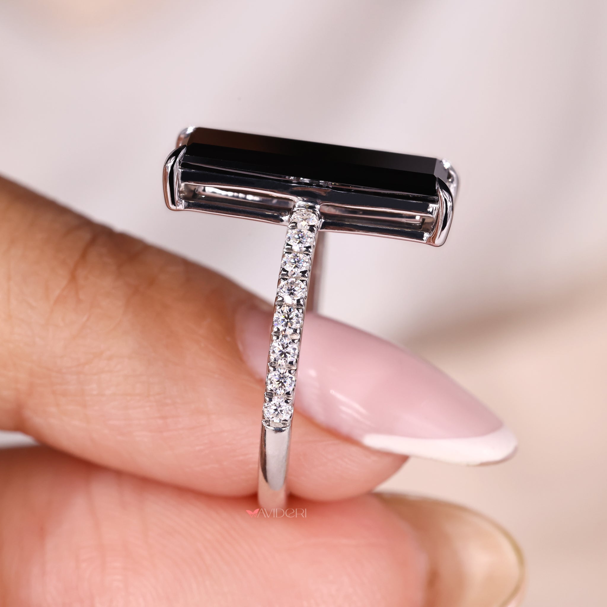 Pave setting moissanite ring with intricate details.