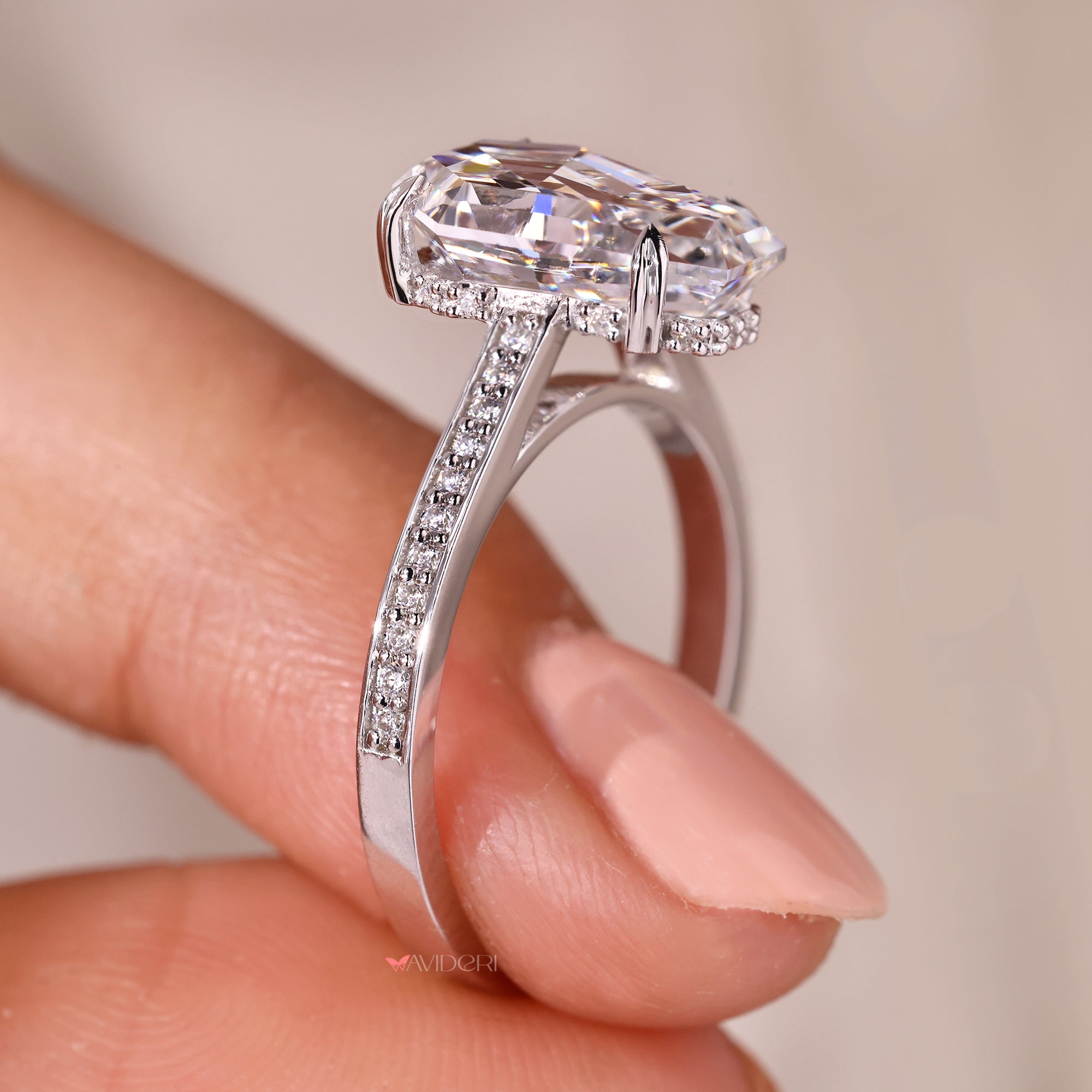 Round cut hidden halo engagement ring with a soft sparkle.