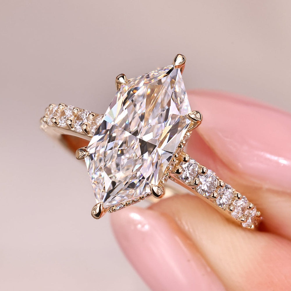Hidden halo engagement ring with dutch marquise ring.