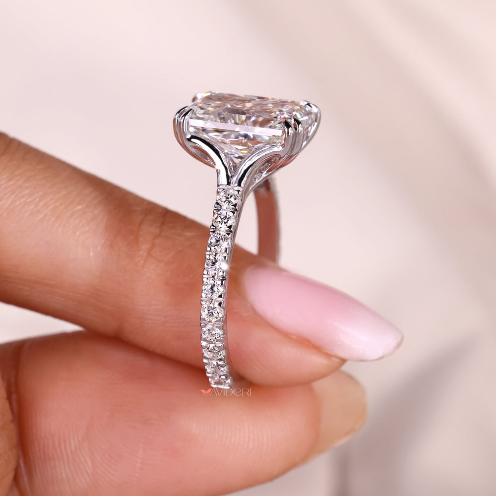 Lab grown radiant cut diamond ring with trellis setting.
