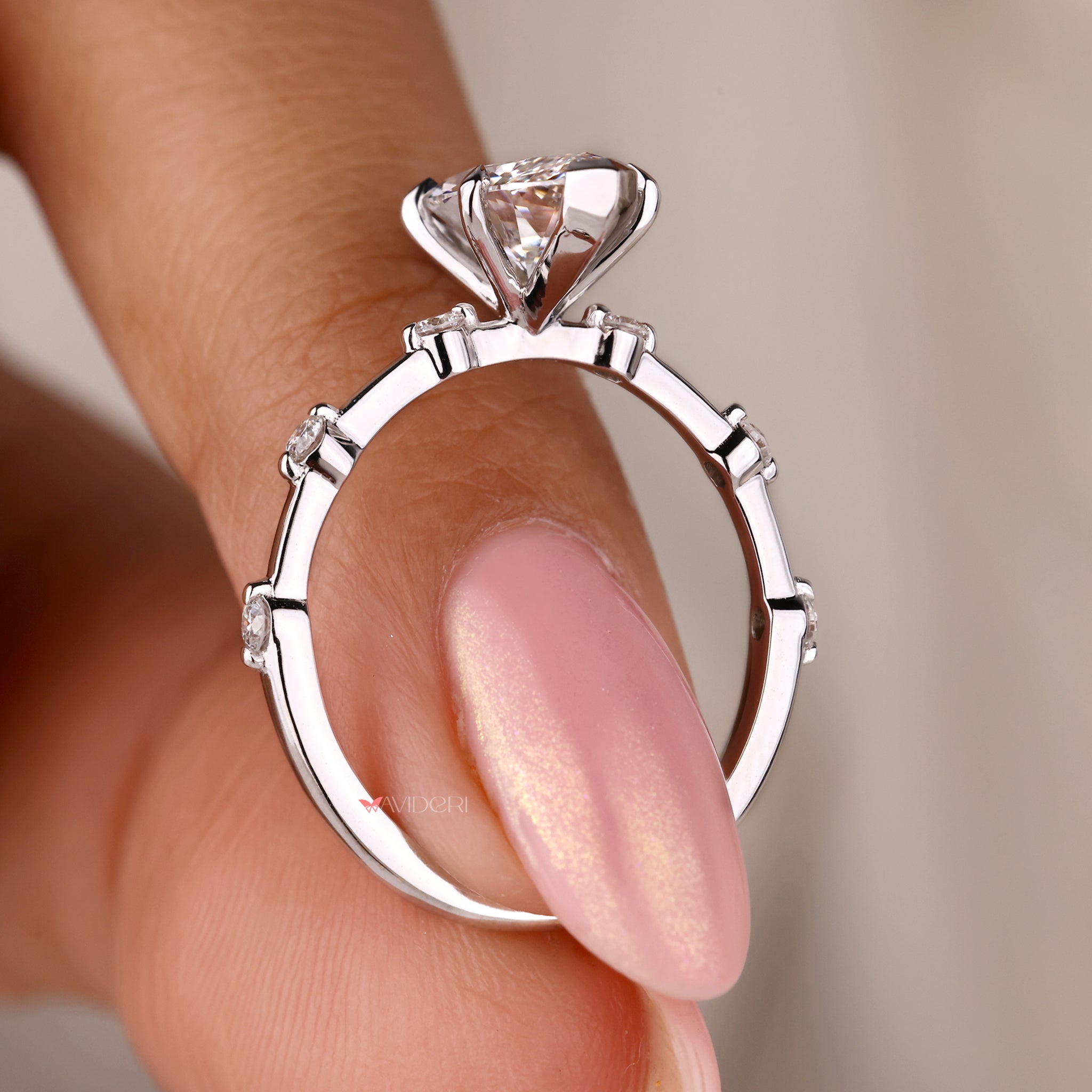White gold ring with a sparkling pave diamond setting.