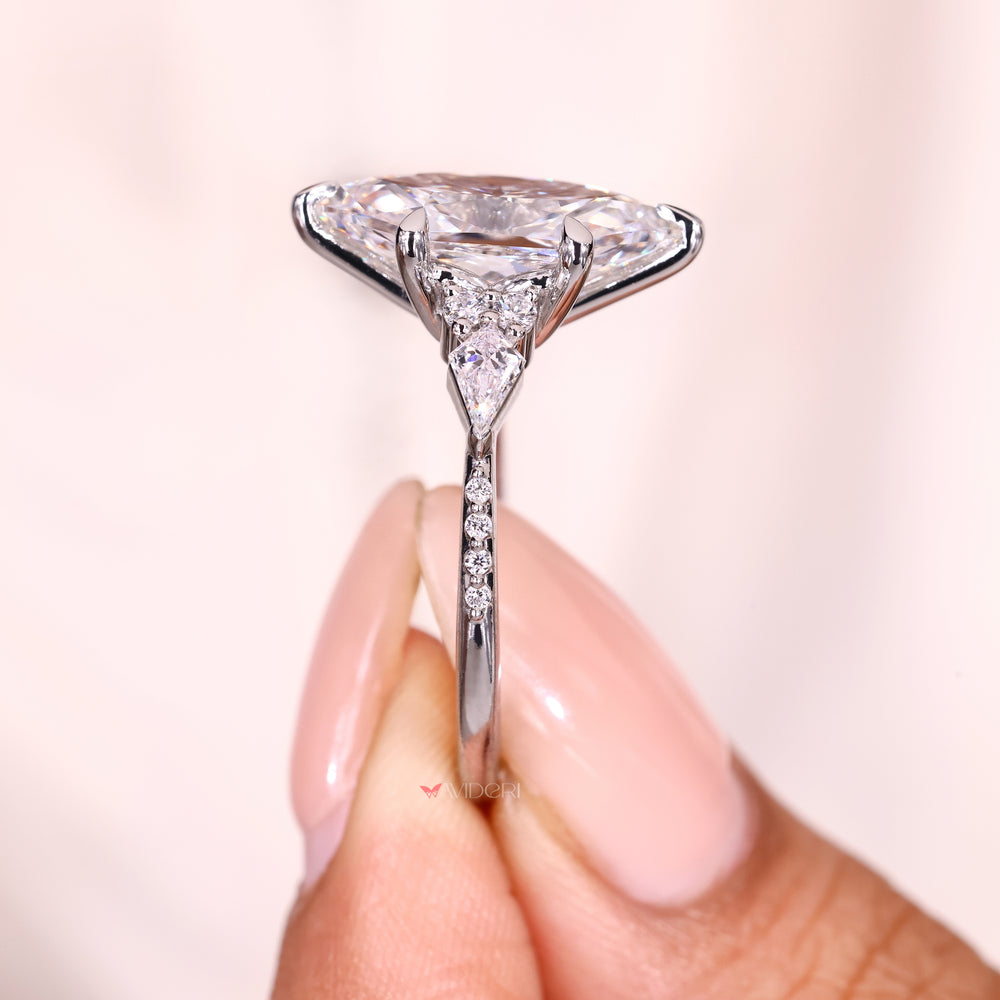 Handmade Dutch marquise diamond ring with six claw prongs
