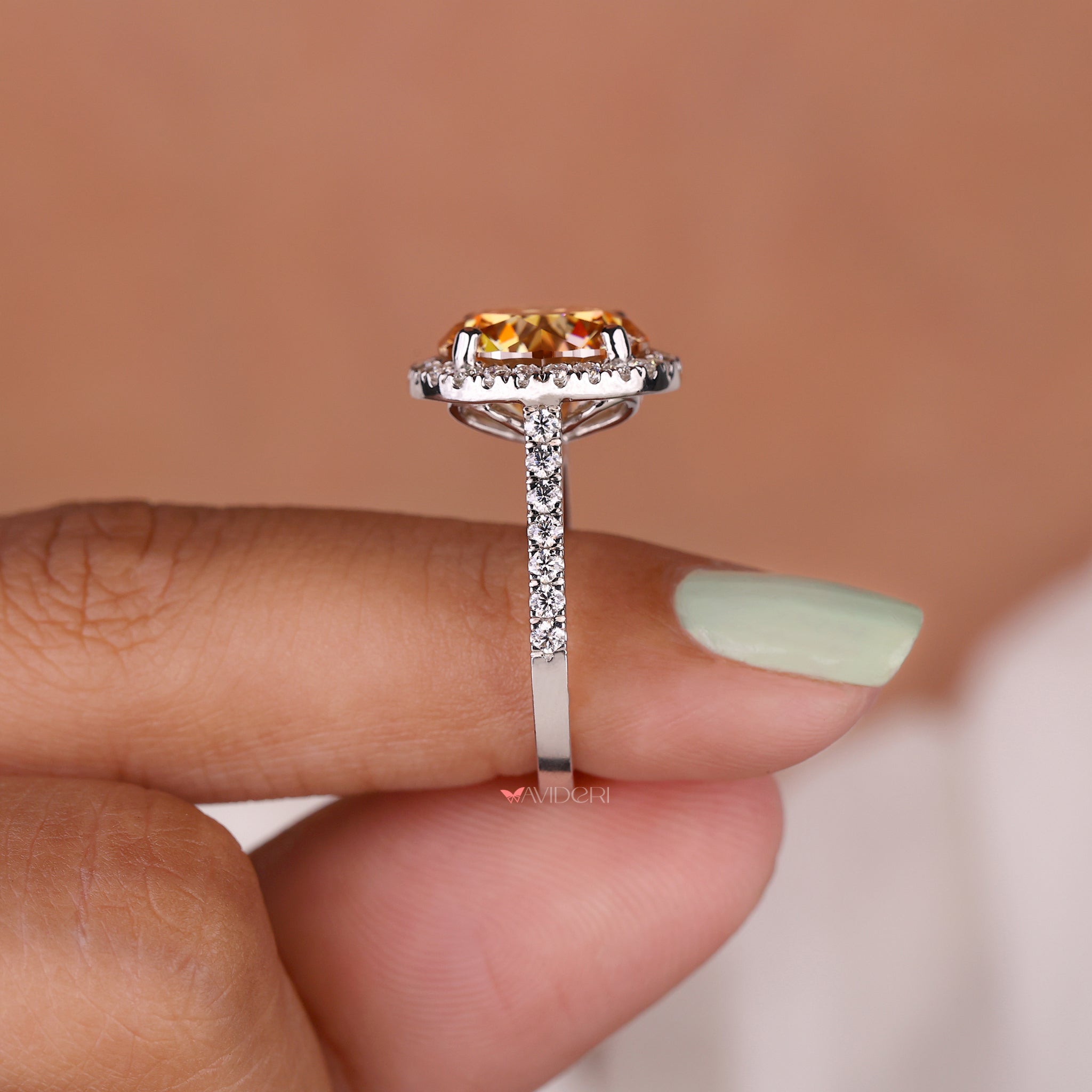 Cathedral setting ring with round cut stone.
