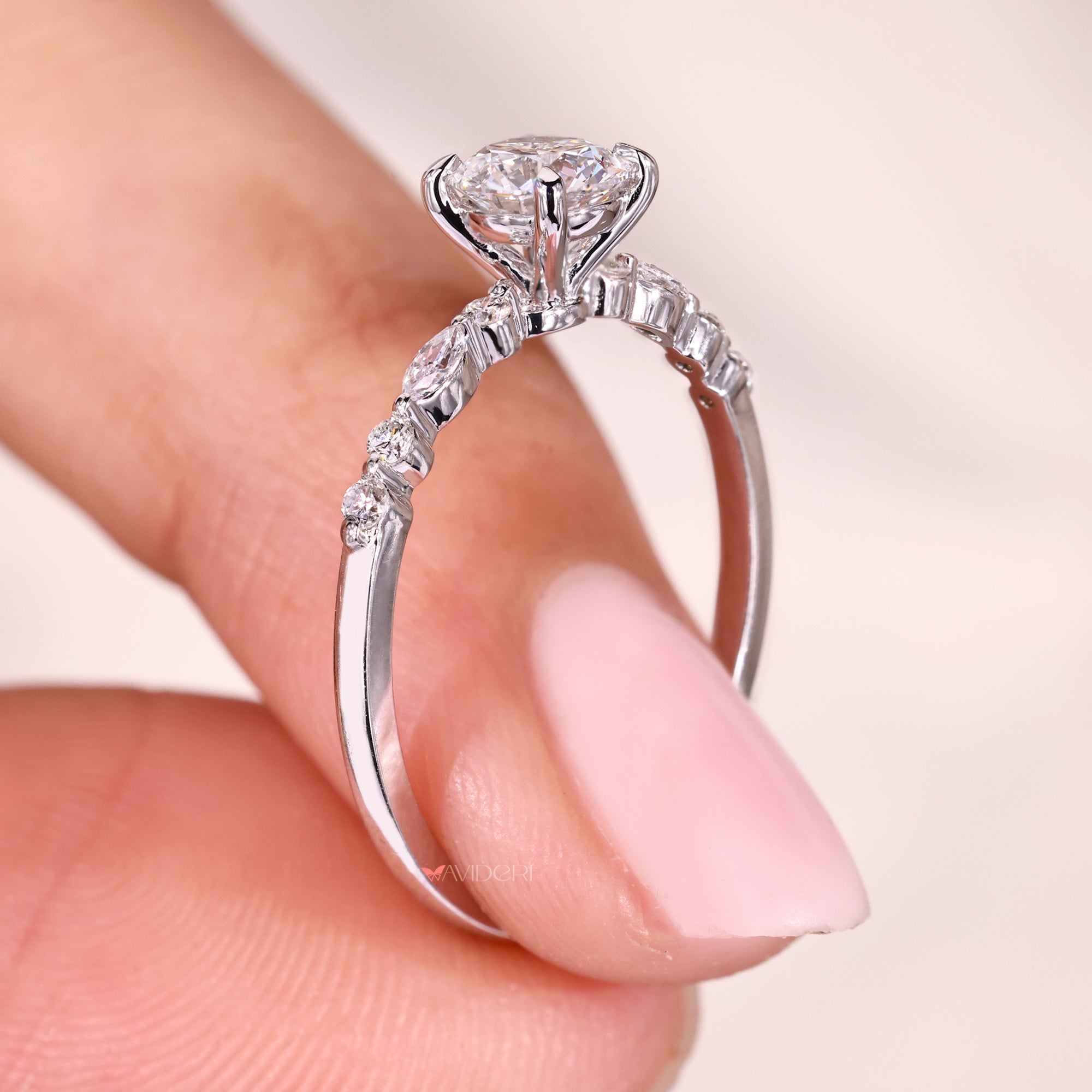 White gold ring accented with side stones.