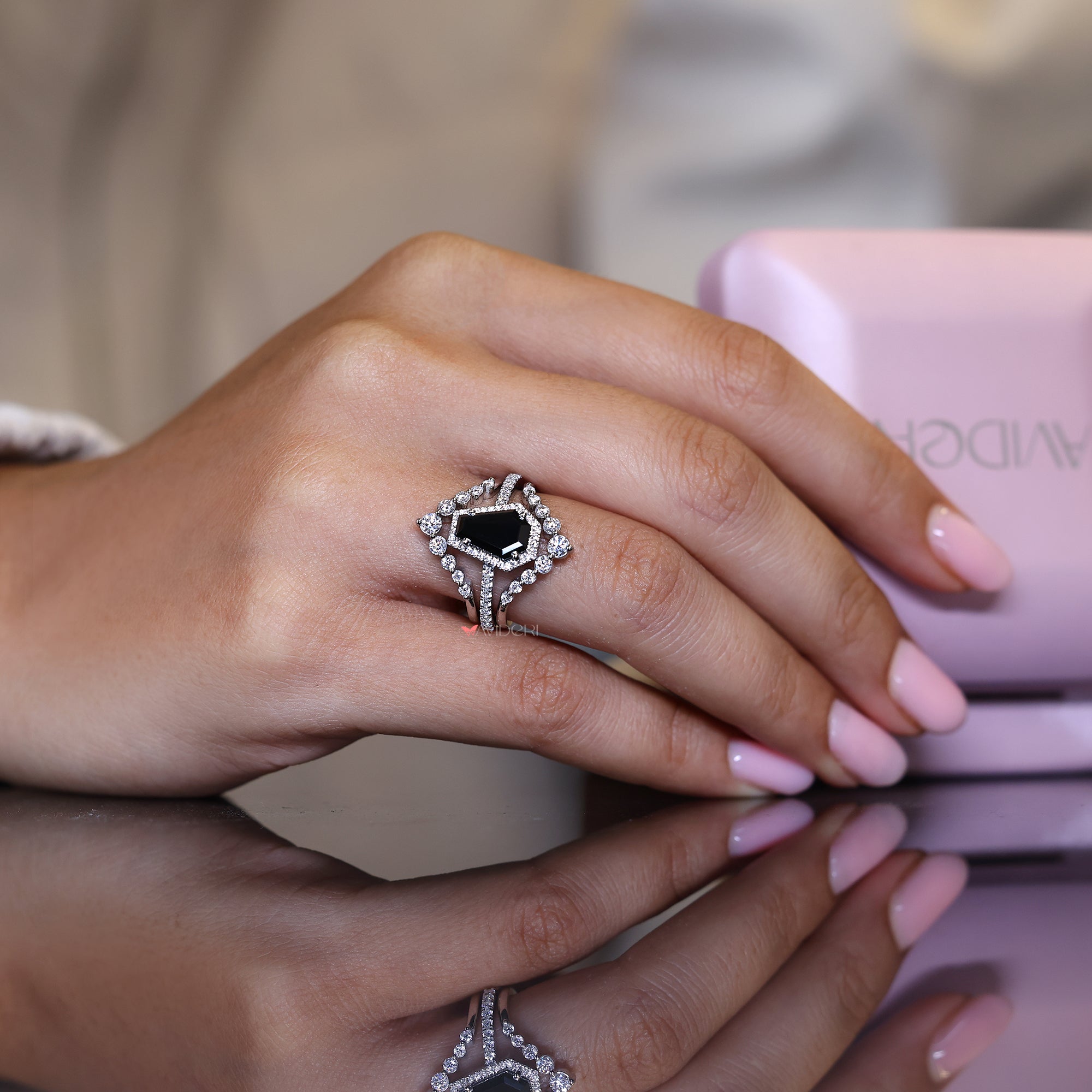 Round cut ring set in a coffin engagement ring for timeless elegance.