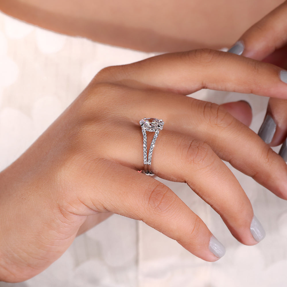 Handmade oval cut diamond ring with split pave shank.
