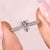 Coffin cut engagement ring on cathedral setting ring.