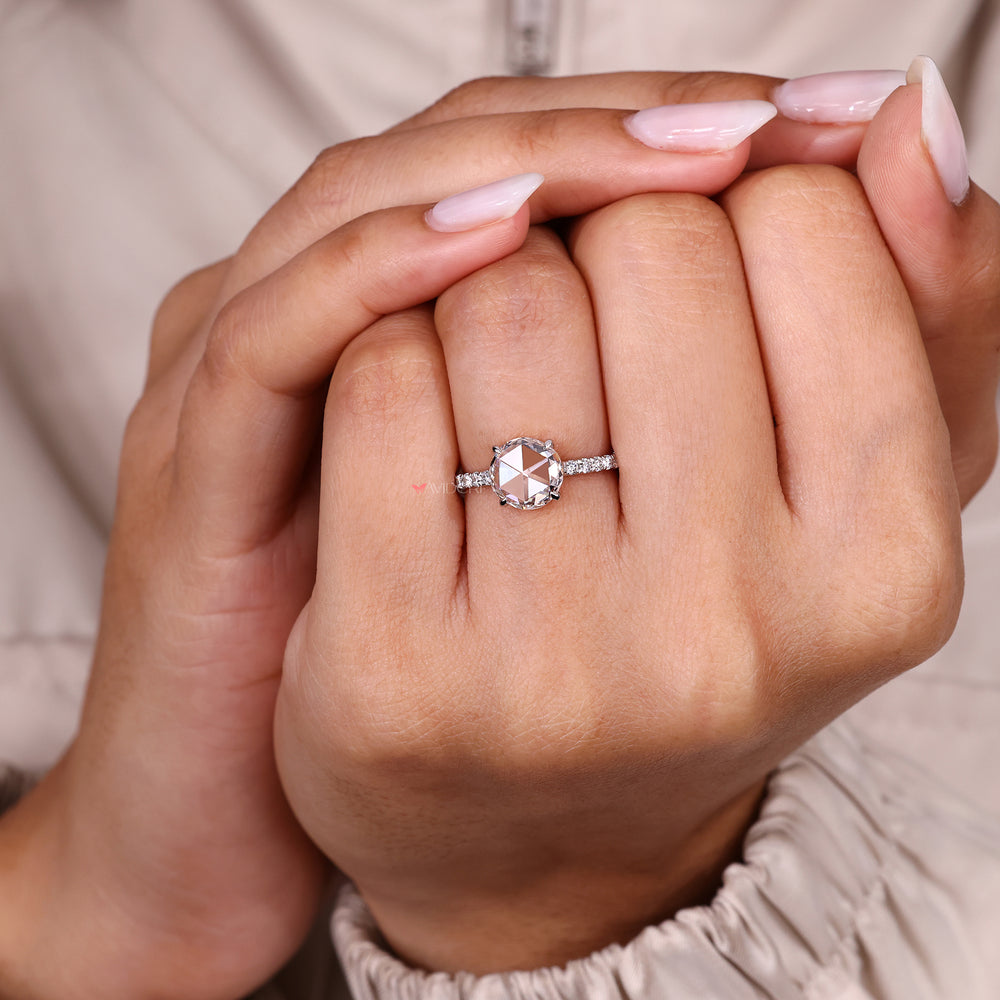 IGI certified round rose cut diamond ring with open gallery.
