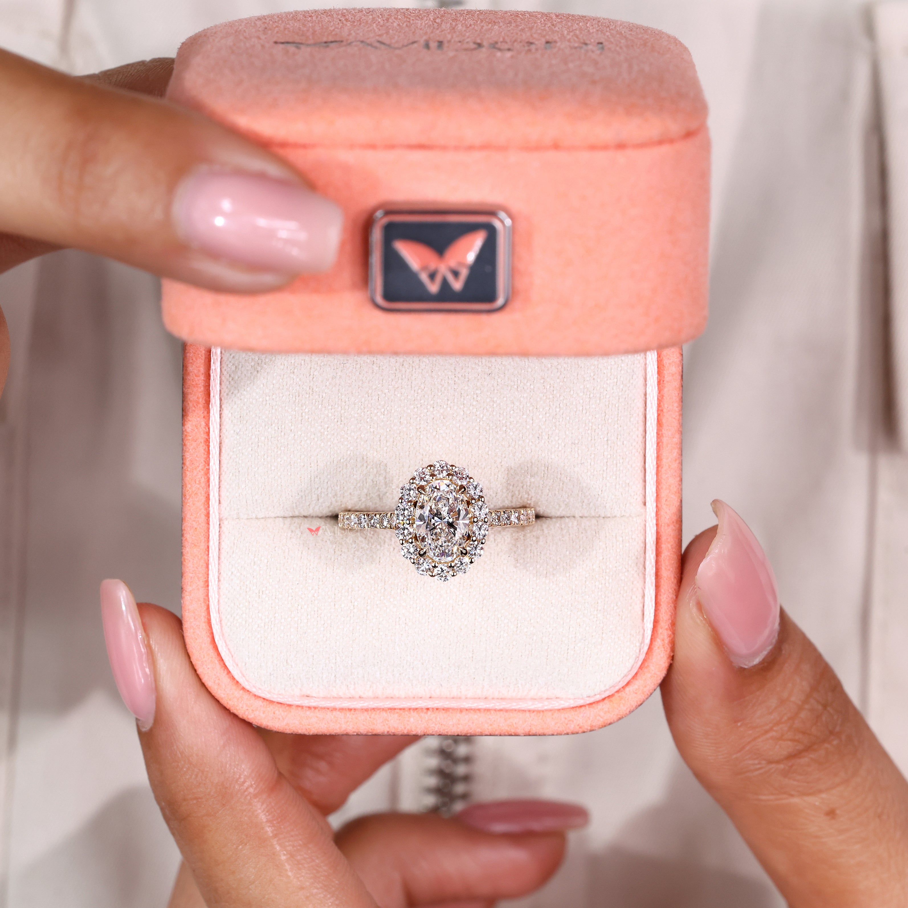 Avideri oval diamond ring with halo and pave accents
