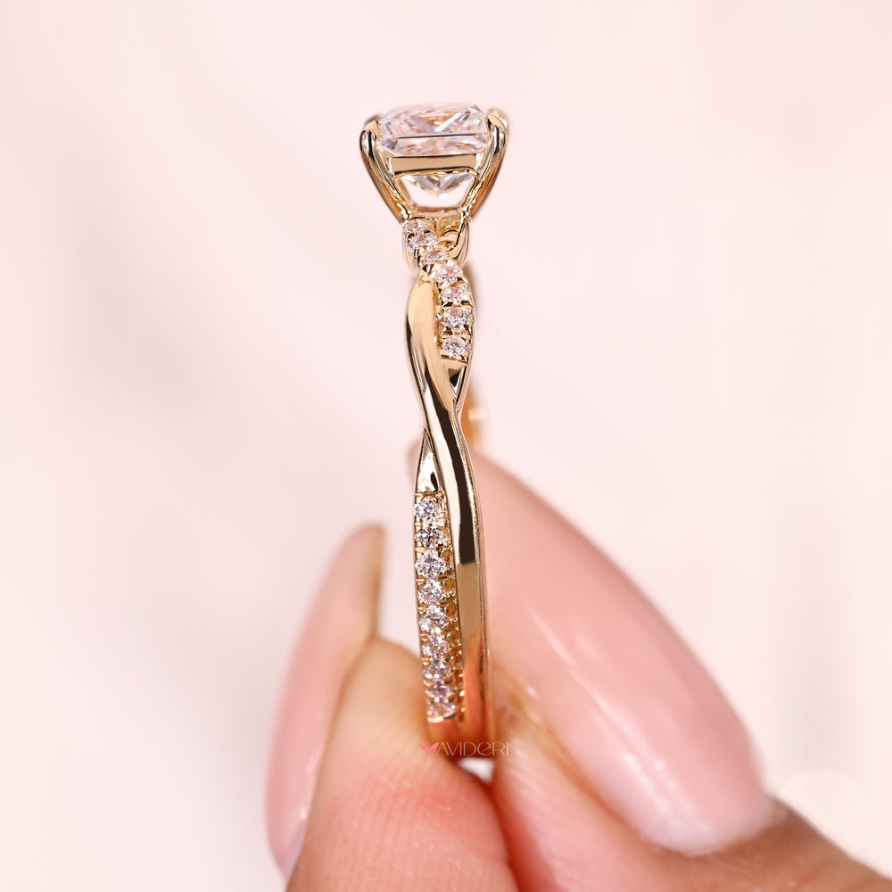 Princess cut diamond ring with pave round side stones
