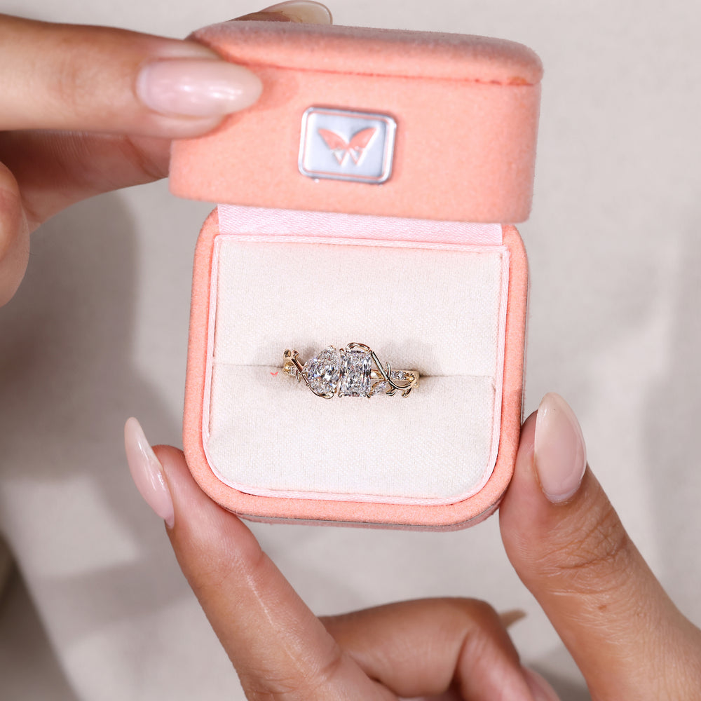 Nature inspired pear and radiant diamond ring.
