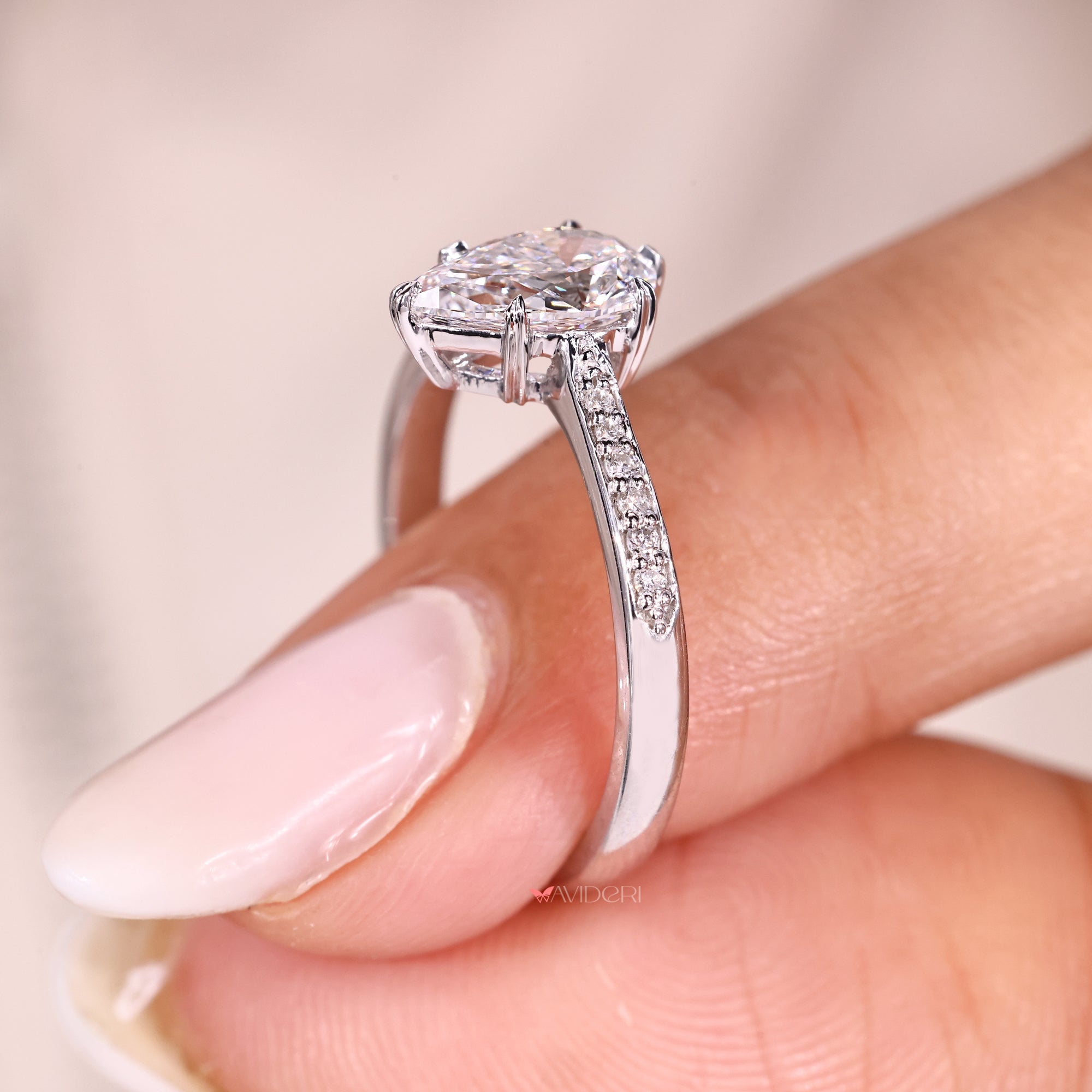 Handmade engagement ring with tapered shank.
