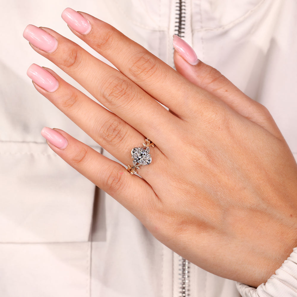 Vintage inspired diamond ring with four leaf prong setting
