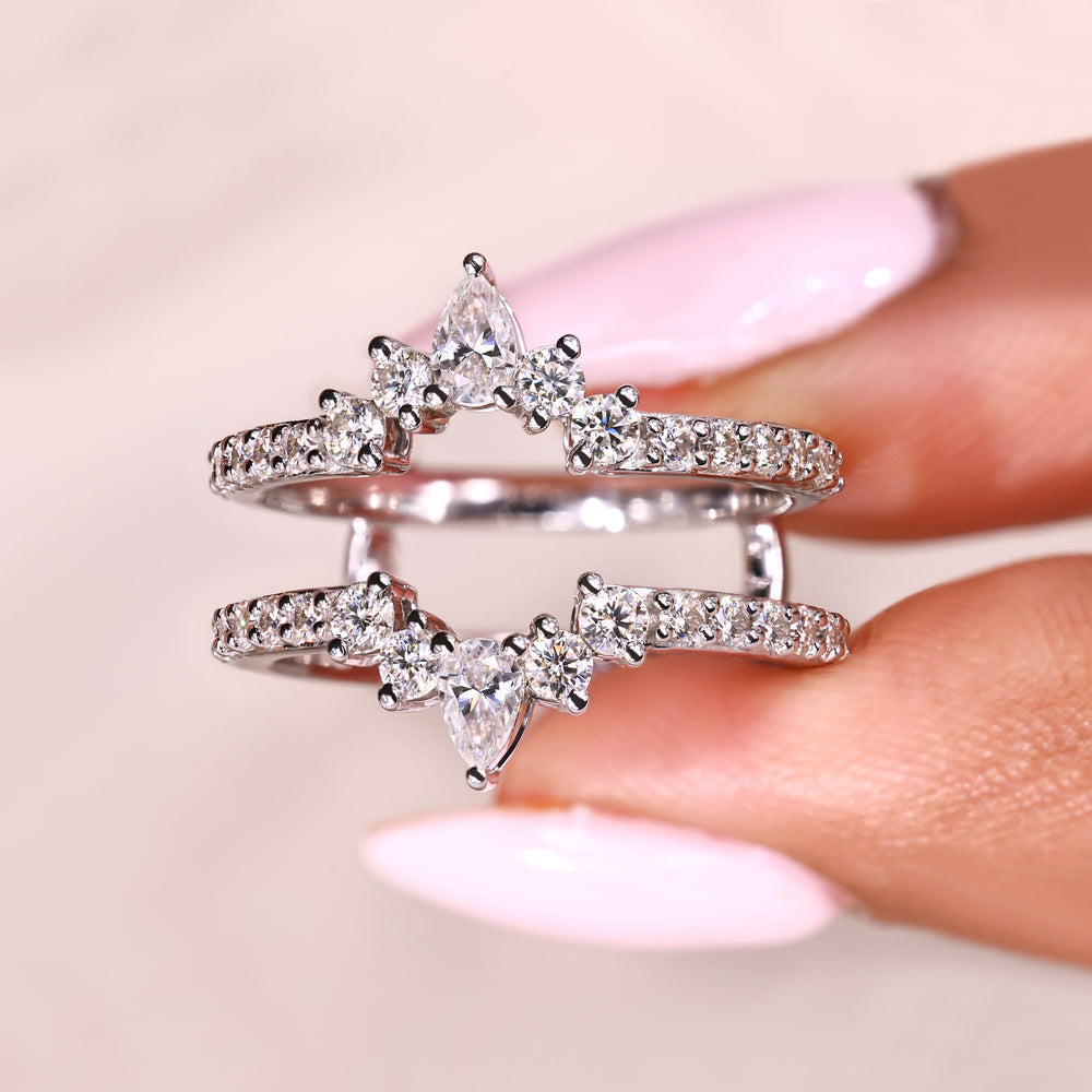 A pear wedding band adds a sleek, rounded shape to your ring.
