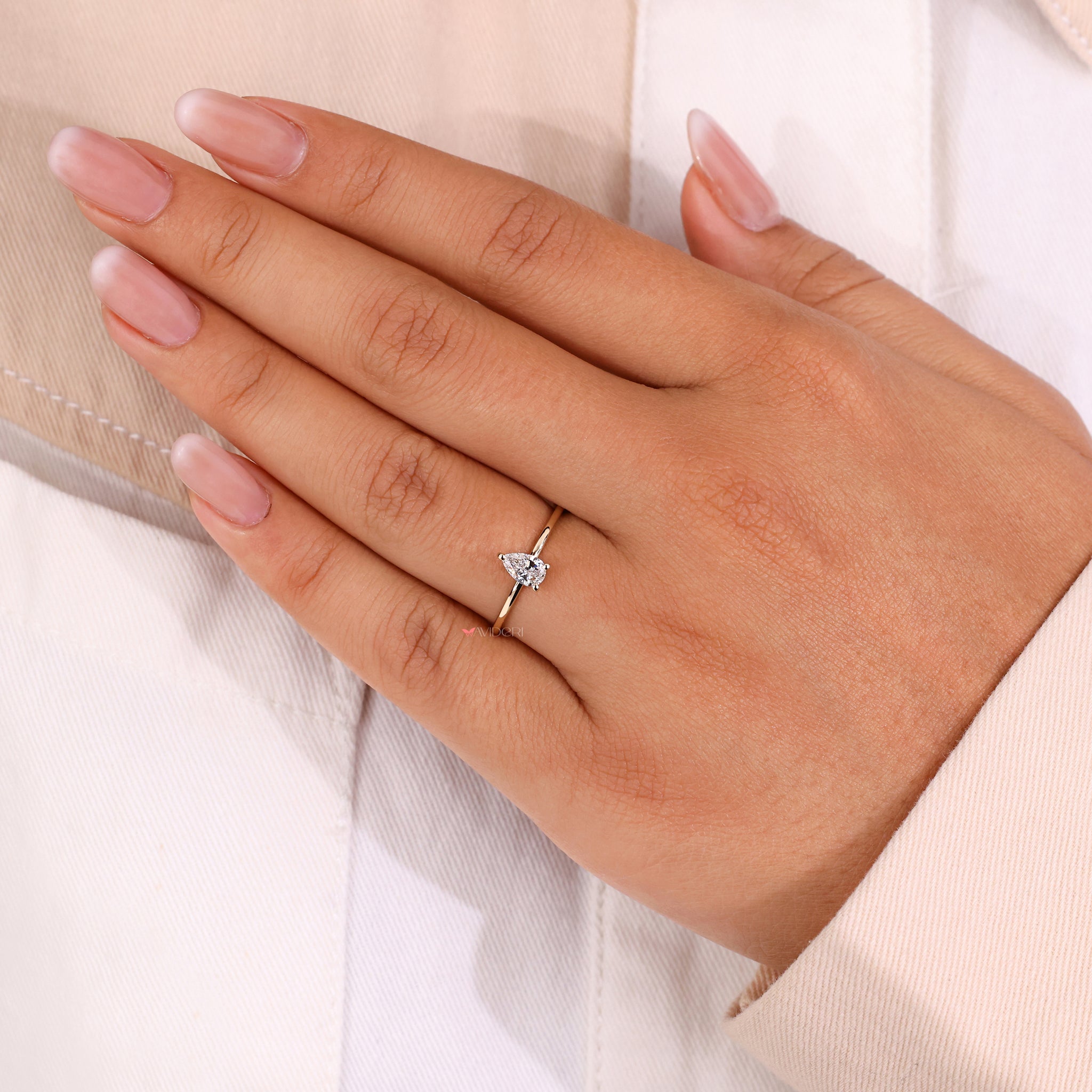 Minimalist engagement ring offering a sleek and modern design for every occasion.
