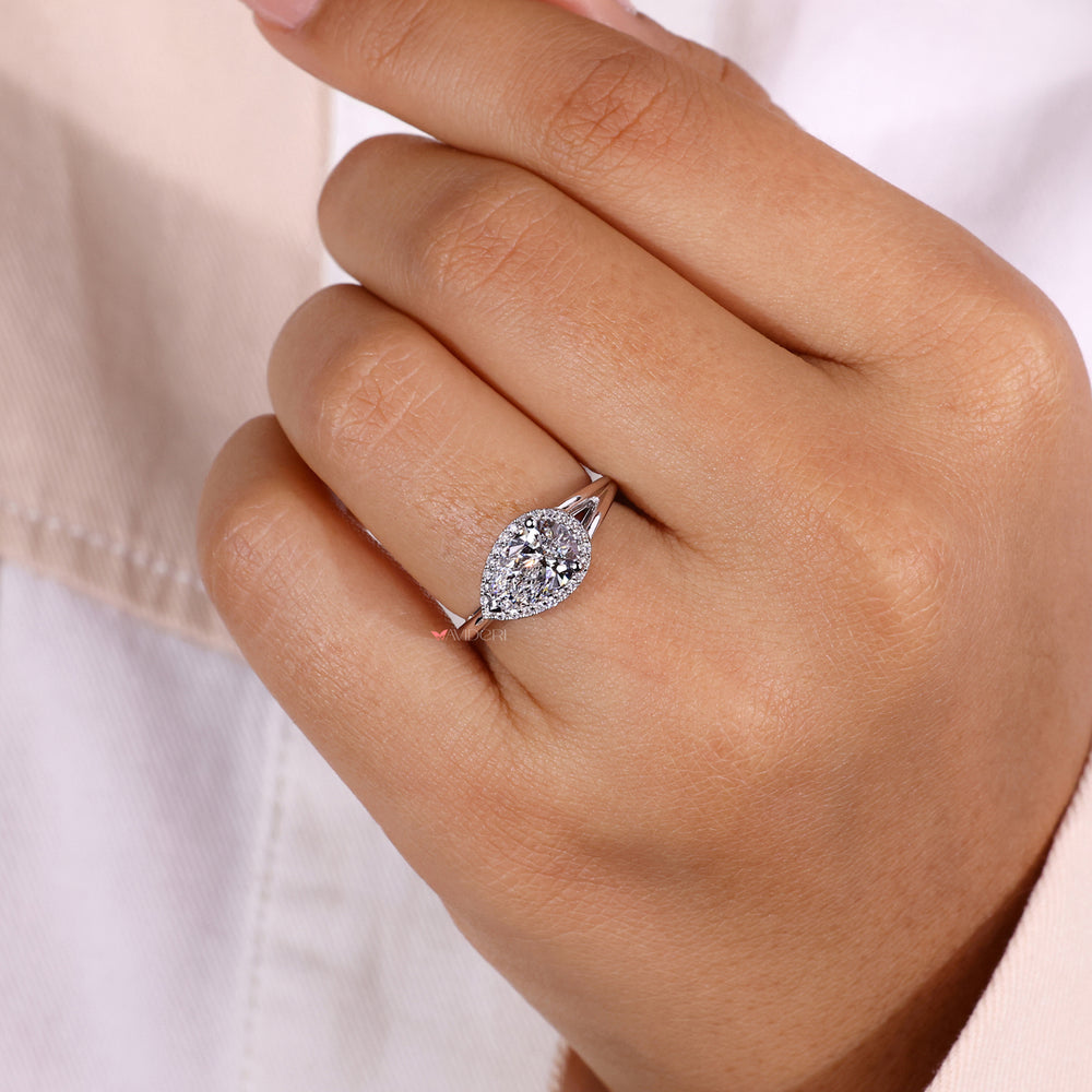 Pear ring with a split shank engagement ring design.
