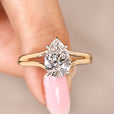 Pear cut lab grown diamond ring in solitaire setting with hidden halo