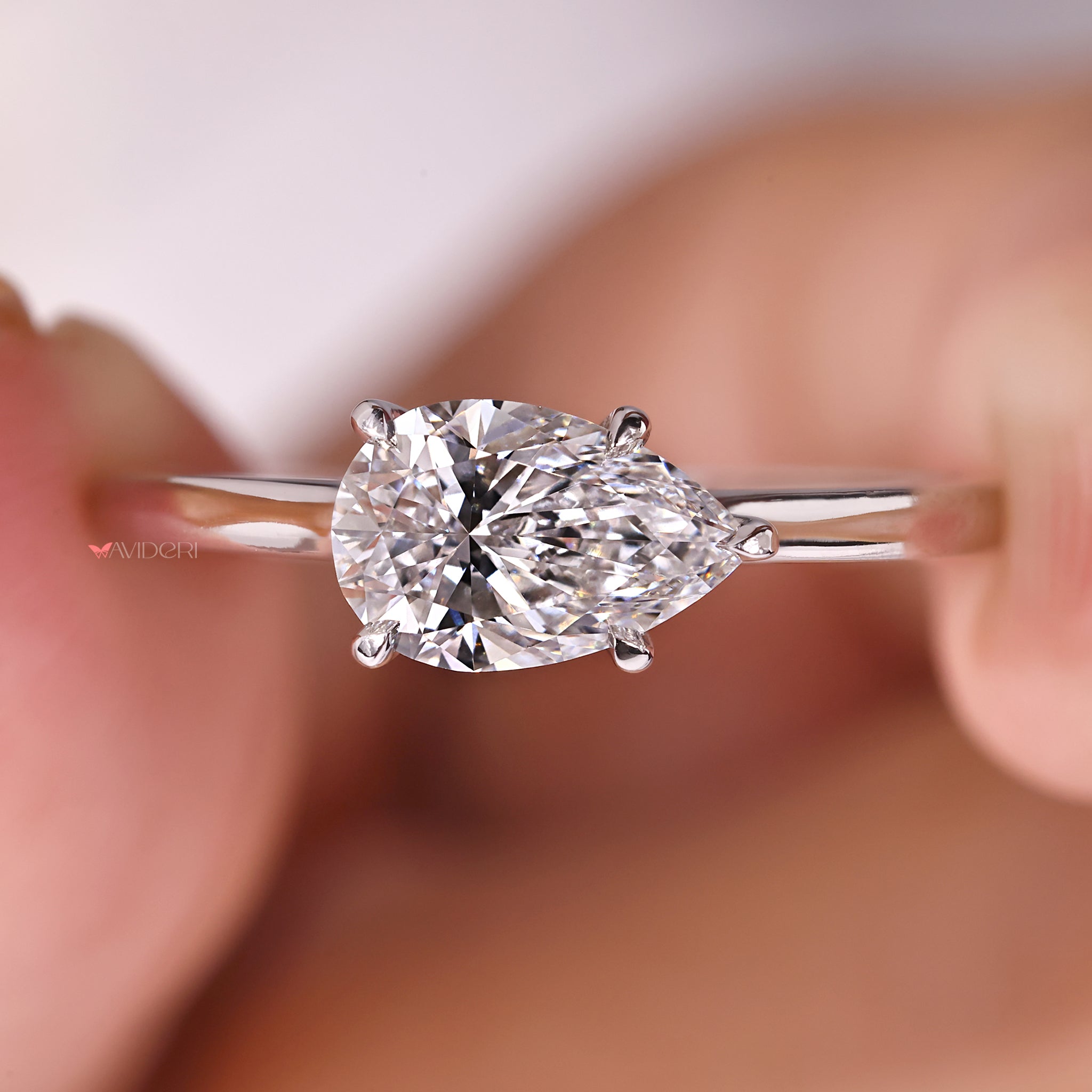 Pear Cut Engagement Ring in white gold, combining classic style with contemporary flair.