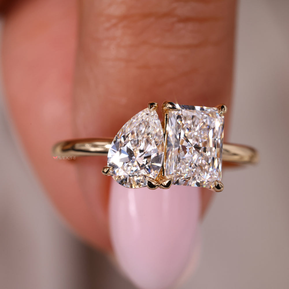 Pear diamond ring set in a toi et moi engagement ring for timeless elegance.
