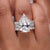 Pear Engagement Ring with Wedding Band featuring Hidden Halo Setting.