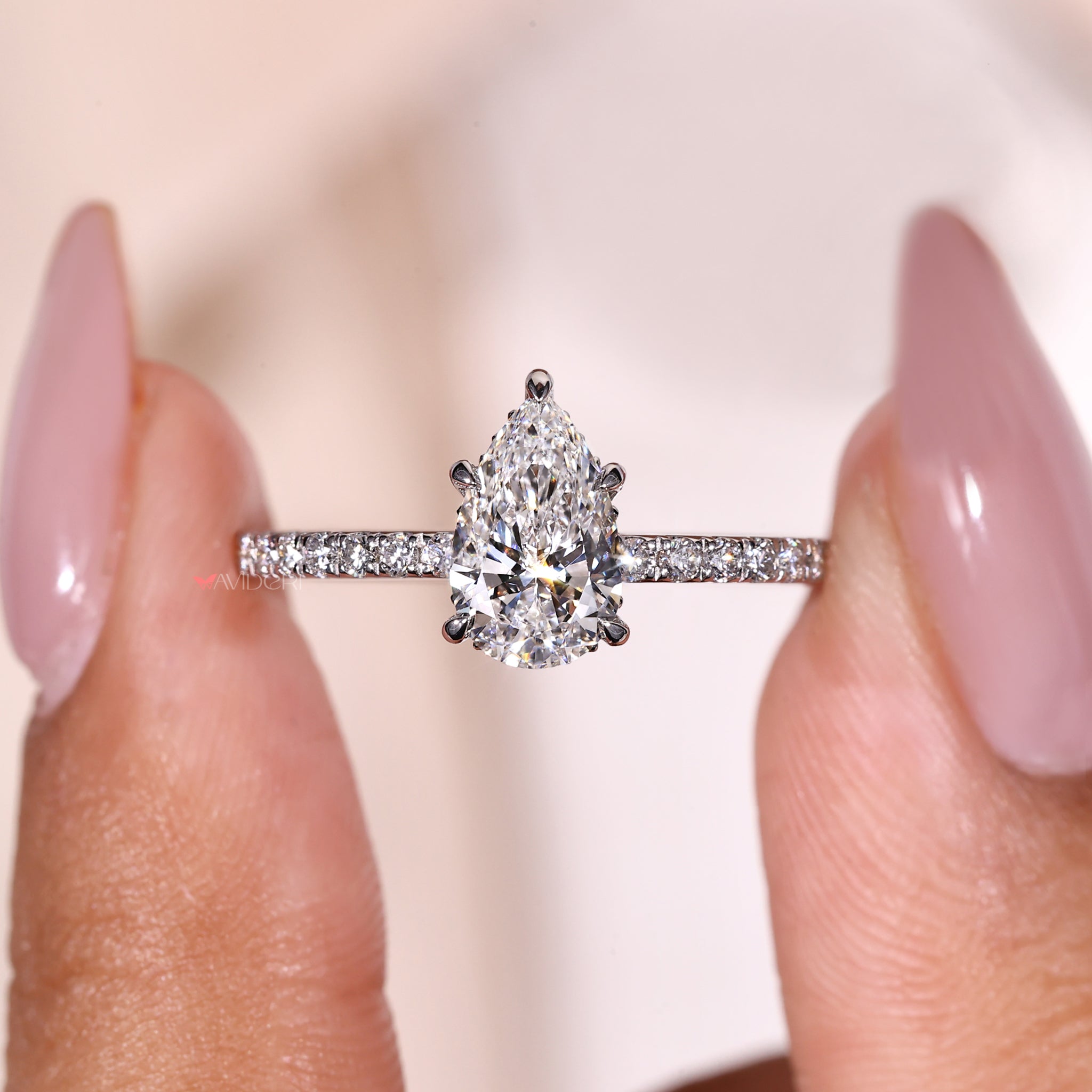 IGI Certified Pear Cut Diamond Ring for guaranteed quality and craft.